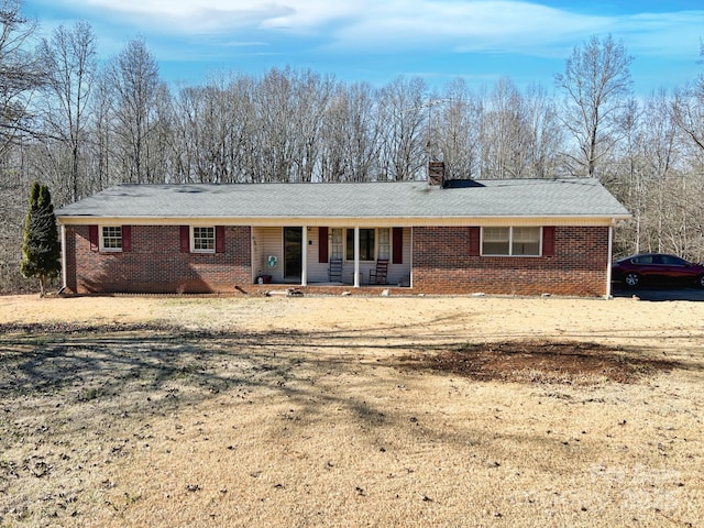 ranch-style home with covered porch