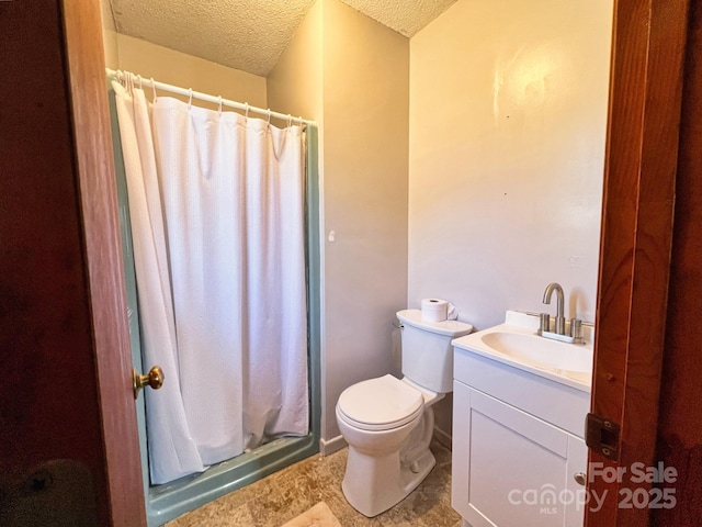 bathroom with vanity, a textured ceiling, toilet, and a shower with shower curtain