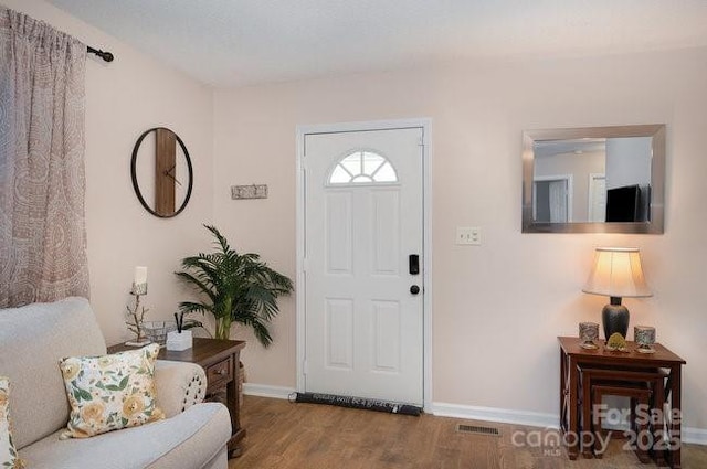 entrance foyer with hardwood / wood-style floors