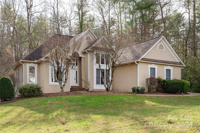 view of front of property with a front lawn