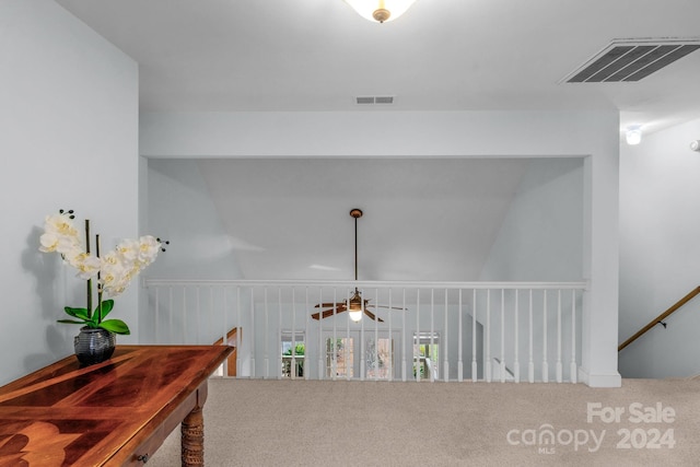 hallway featuring carpet floors