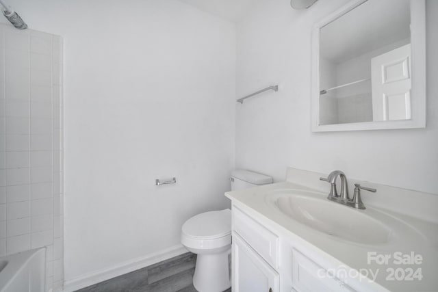 full bathroom with vanity, toilet, and bathing tub / shower combination