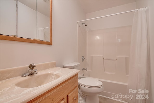 full bathroom with shower / bath combo with shower curtain, vanity, hardwood / wood-style floors, and toilet