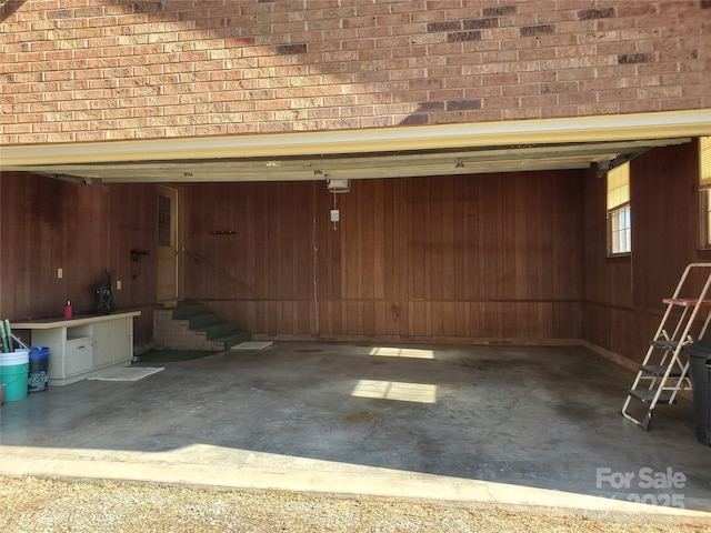 garage with wood walls