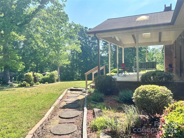 view of yard with a patio area
