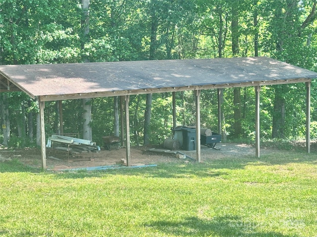 view of home's community with a yard