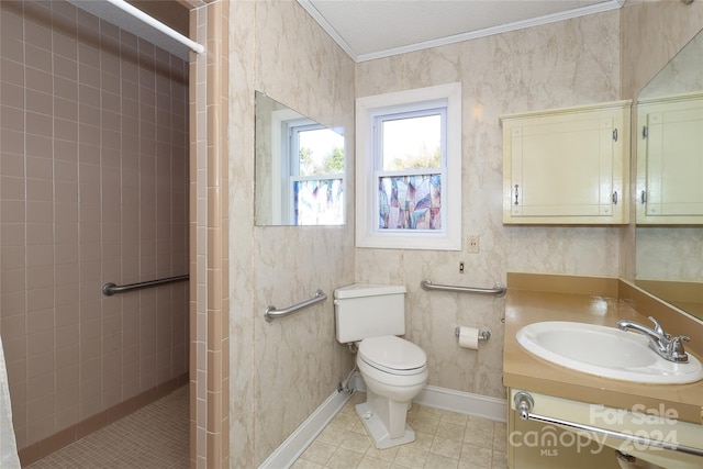 bathroom featuring vanity, tile patterned floors, toilet, a textured ceiling, and a tile shower