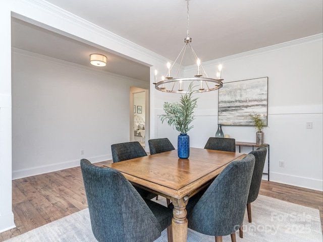 320 Triple Ponds Ct, Clover, SC 29710 - dining area with a chandelier, wood finished floors, ornamental molding, and baseboards