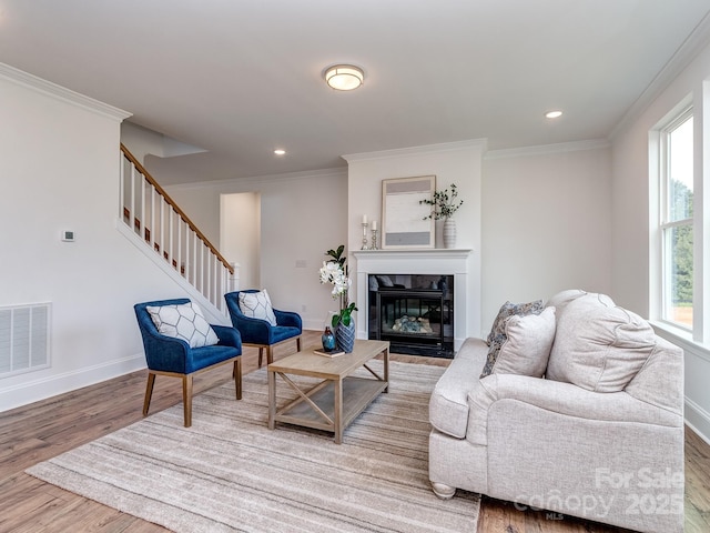 320 Triple Ponds Ct, Clover, SC 29710 - living area featuring wood finished floors, stairs, baseboards, crown molding, and recessed lighting