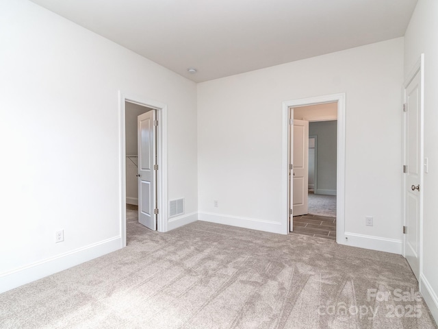 320 Triple Ponds Ct, Clover, SC 29710 - unfurnished bedroom featuring carpet flooring, baseboards, and a spacious closet