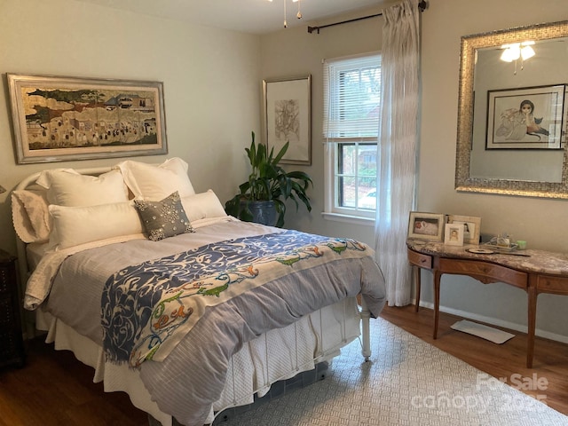 bedroom featuring hardwood / wood-style floors