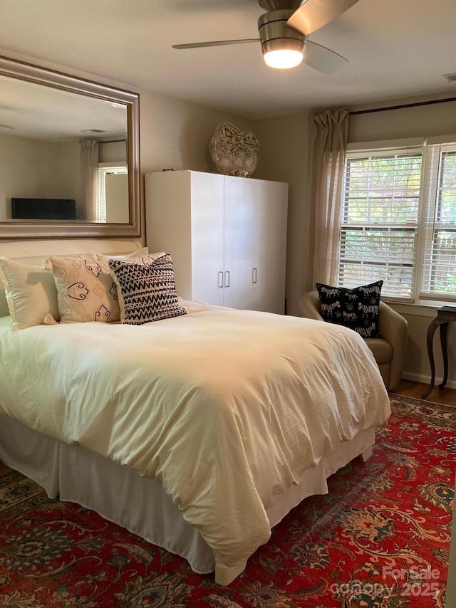 bedroom featuring ceiling fan