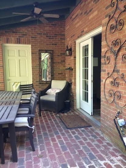 view of patio with ceiling fan