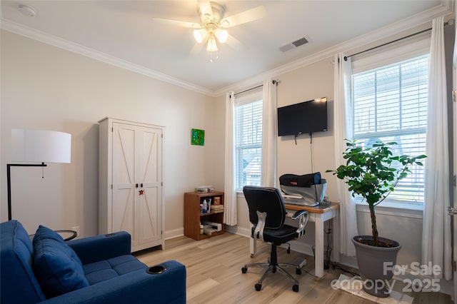 office space with crown molding, ceiling fan, plenty of natural light, and light hardwood / wood-style floors