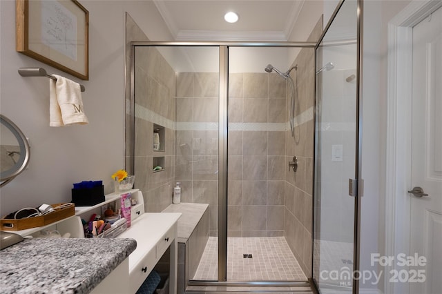 bathroom with crown molding and walk in shower