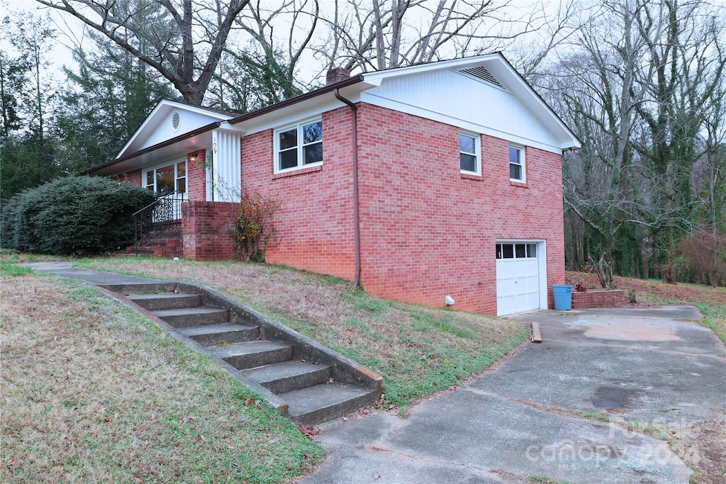 view of home's exterior with a garage