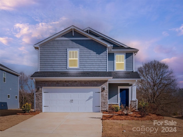 view of front of home featuring a garage