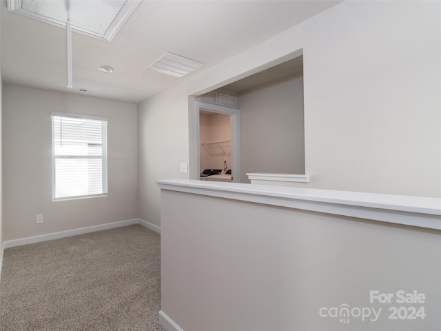 unfurnished room featuring carpet flooring