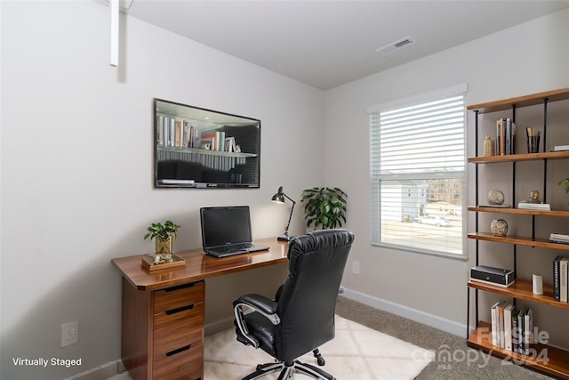 office featuring light colored carpet