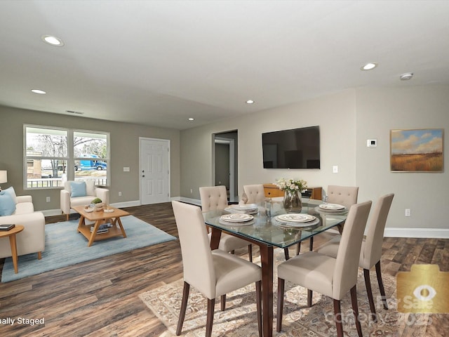 dining space with recessed lighting, visible vents, dark wood finished floors, and baseboards