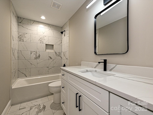 full bath with marble finish floor, recessed lighting, toilet, vanity, and shower / tub combination