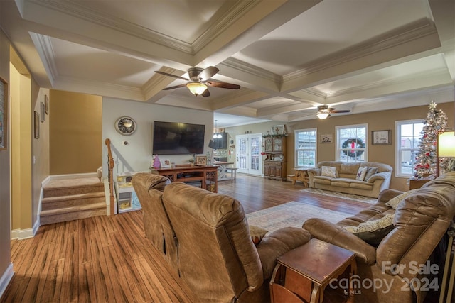 living room with beam ceiling, ceiling fan, hardwood / wood-style floors, and crown molding