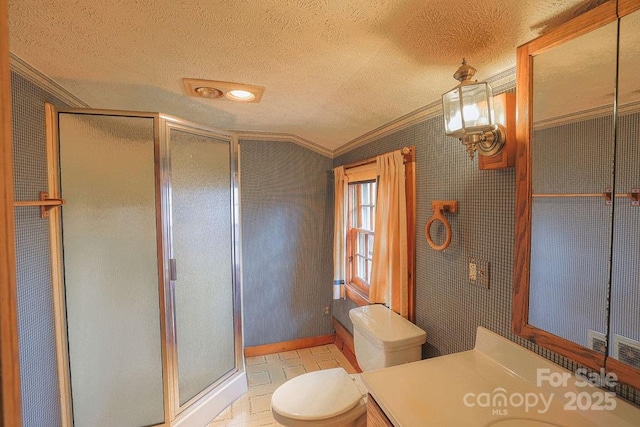 bathroom featuring toilet, an enclosed shower, vaulted ceiling, a textured ceiling, and vanity