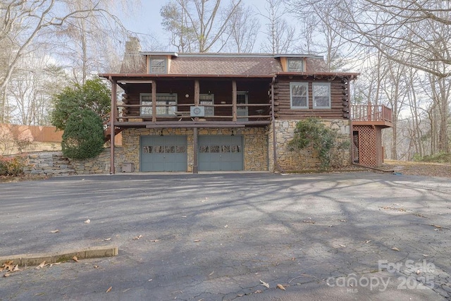 view of front of property with a garage