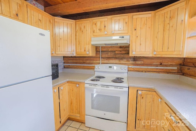 kitchen featuring beam ceiling, light tile patterned flooring, light brown cabinets, and white appliances