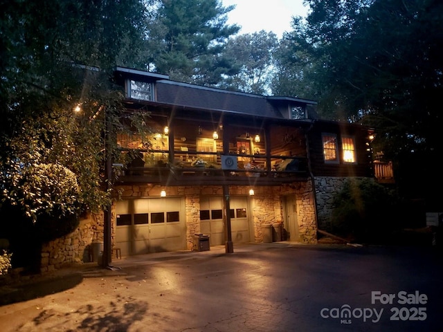 view of front of property with a garage