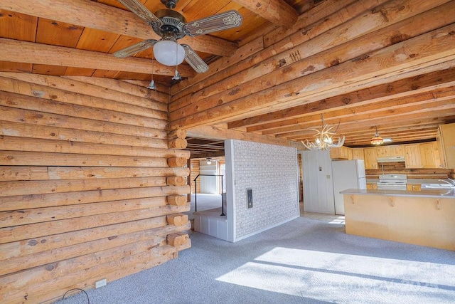interior space with a ceiling fan, a sink, and area for grilling