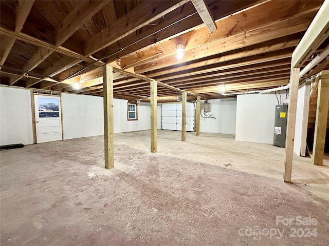 basement featuring electric water heater