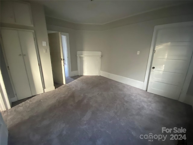 spare room featuring carpet