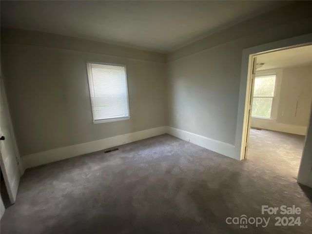 view of carpeted spare room