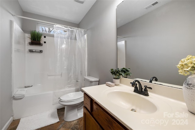 full bathroom with vanity, toilet, and shower / tub combo with curtain