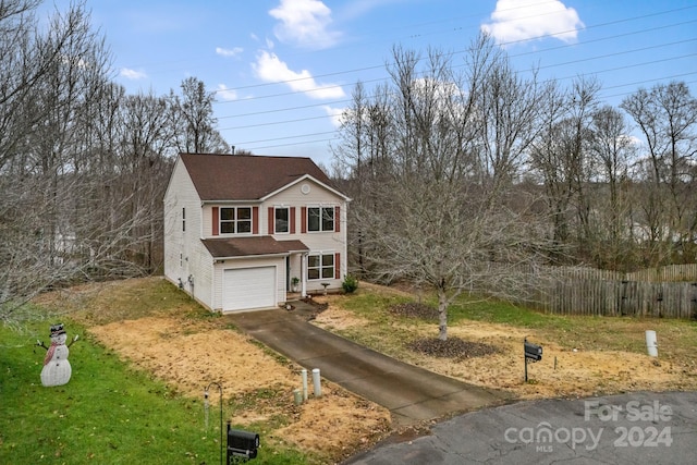 view of front property with a garage