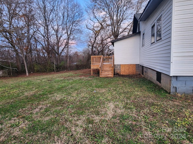 view of yard featuring a deck