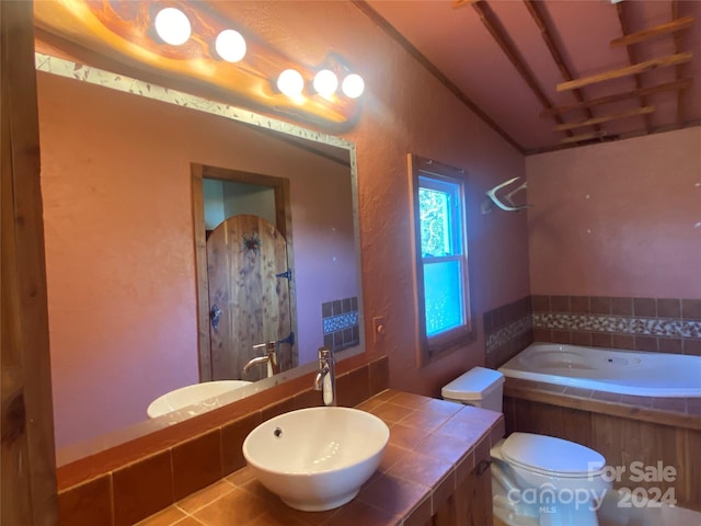 full bathroom with vanity, lofted ceiling, tile patterned floors, separate shower and tub, and toilet