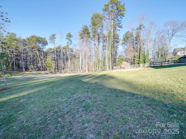 view of yard featuring fence