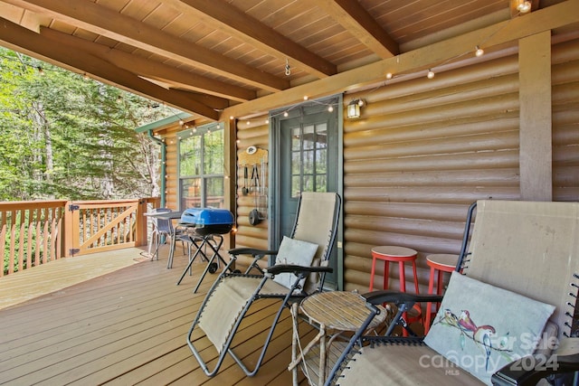 wooden deck with area for grilling