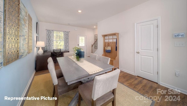 dining area featuring hardwood / wood-style flooring