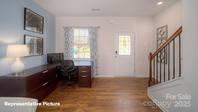 office with baseboards, visible vents, dark wood finished floors, and recessed lighting