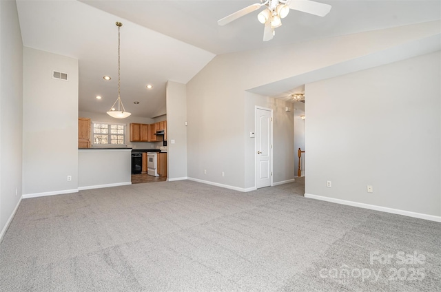 unfurnished living room featuring carpet flooring, ceiling fan, and lofted ceiling