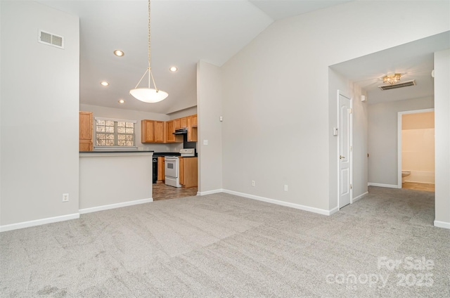 unfurnished living room with light carpet and lofted ceiling