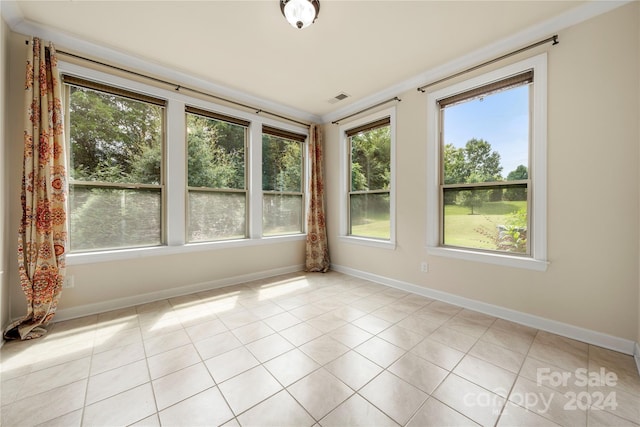 unfurnished sunroom with a wealth of natural light