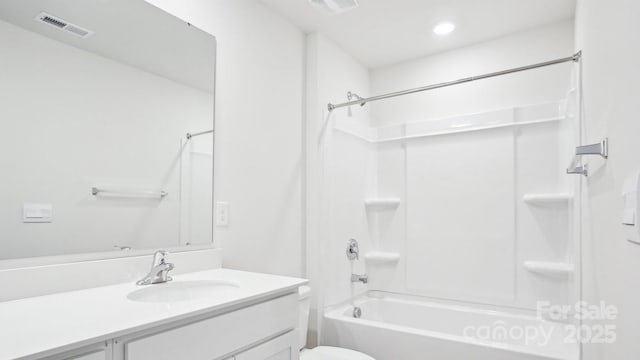 full bathroom featuring visible vents, shower / bathing tub combination, vanity, and toilet