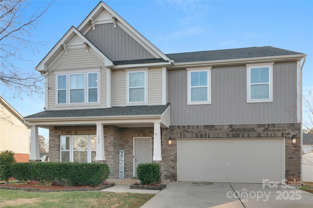 craftsman house with a garage