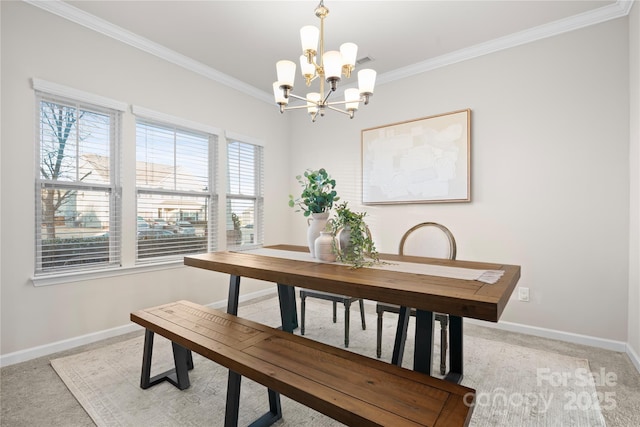 dining area featuring light colored carpet, crown molding, and a chandelier