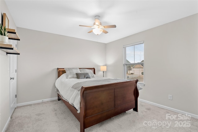 bedroom with light carpet and ceiling fan