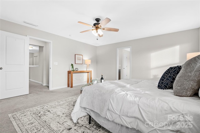 bedroom featuring light carpet and ceiling fan